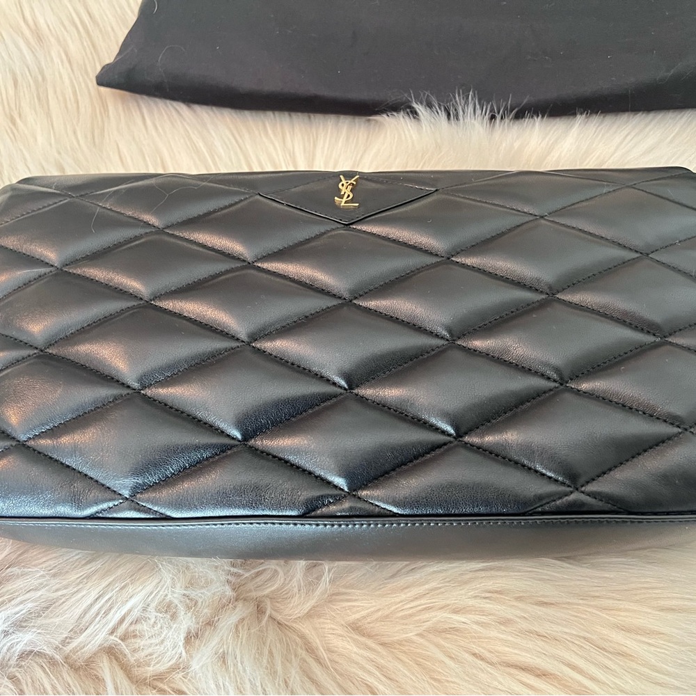 YSL Sade Puffy Clutch 
Like new *  used once.